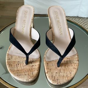 Stuart Weitzman black Brigida black thong sandal. Leather. 2 inch heel.